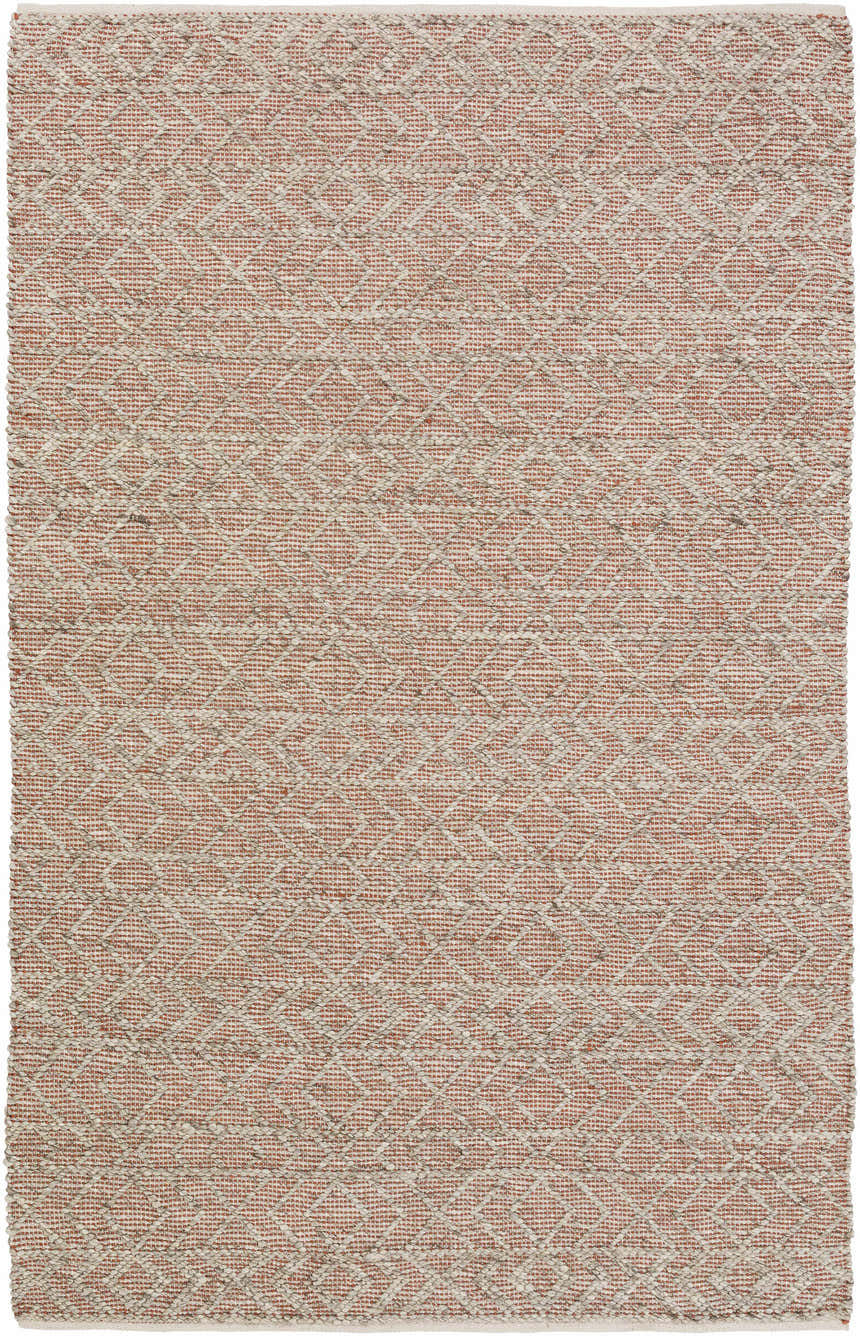 Close-up of the Harlingen Area Rug. Hand-woven viscose rug in brick red and light gray with a diamond pattern. Farmhouse style. Design-Rectangle-576