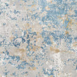 Close-up of Hawes Faux Silk Rug showing light blue, gray, off white, and mustard abstract pattern and soft viscose texture. Swatch