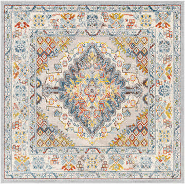 Close-up of the Haymond Area Rug. Bohemian style rug with brick red, charcoal, cream, and blue oriental pattern. Design-Square-65