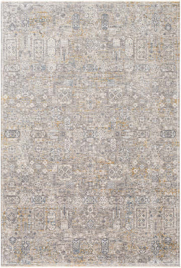 Close-up of the Heacham Luxe Fringe Rug in blue, camel, and gray. Contemporary distressed pattern and fringe detail. Design-Rectangle-6796