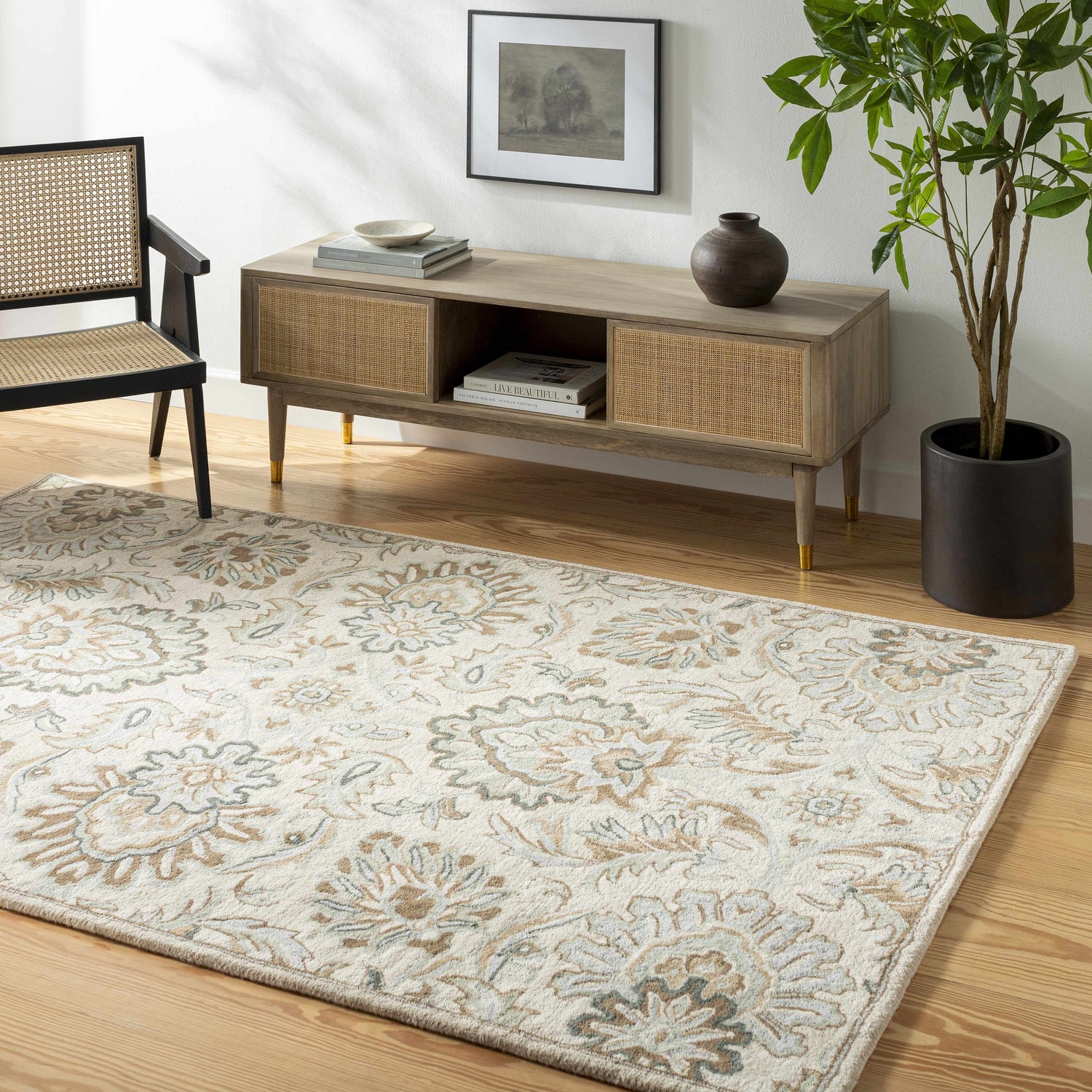 Living room scene with a beige Helia Area Rug, wood floors, and a mid-century modern console table. Roomscene-Rectangle