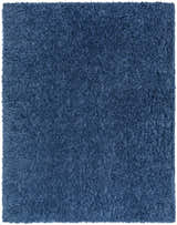 Close-up of the Faina Solid Dark Blue Shag Washable Area Rug, showing its dense, soft texture and rich, solid blue color. Design-Rectangle-537