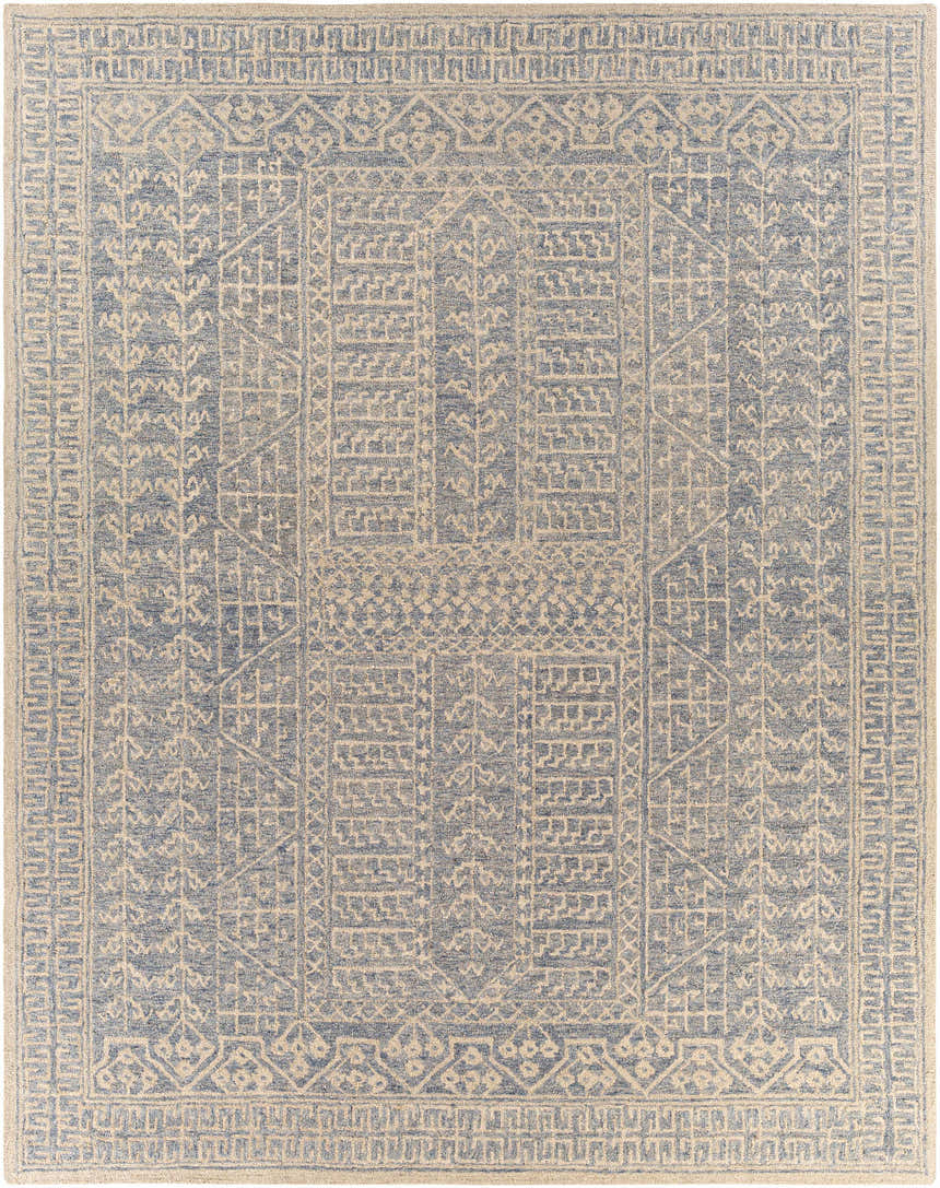 Close-up of Hinton Wool Area Rug. Hand-tufted wool rug with a geometric pattern in light blue and beige. Design-Rectangle-810