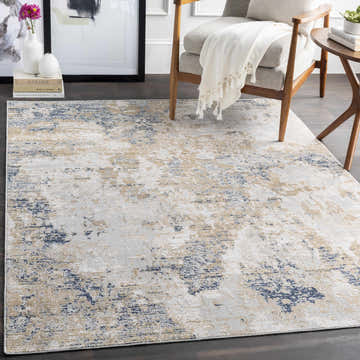 Living room scene with a Hamlet Area Rug in dark blue, light gray, mustard, oatmeal, and off-white colors. Roomscene-Rectangle
