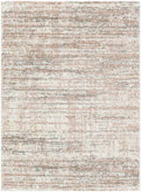 Close-up of the plush Hammond Dusty Pink Rug. Cream, pink, and gray hues create a soft, textured shag rug. Design-Rectangle-5373