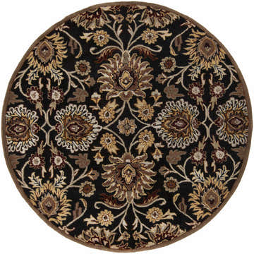 Close-up of a round Conesus 1053 rug. Hand-tufted black wool with brown, mustard, and dark red floral pattern. Design-Round-6