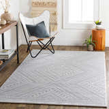 Transitional living room with a Holytown 5x7 Gray Geometric Rug, white chair, wood accents, and neutral wall decor. Roomscene-Rectangle
