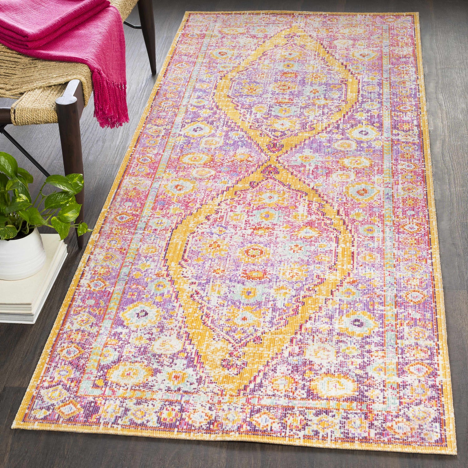 Farmhouse mudroom scene with a Horley Area Rug runner in purple, pink, and gold on a dark wood floor. Roomscene-Runner