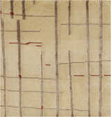 Close-up of the Hotchkiss Area Carpet. Hand-knotted wool rug with light brown, brick red, and mustard geometric pattern. Texture