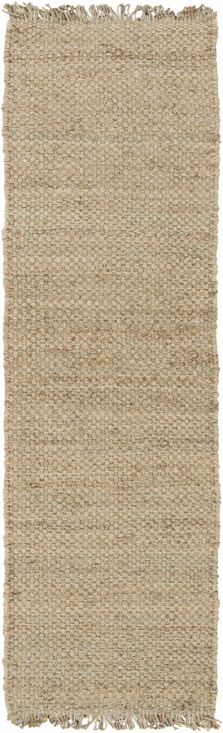 Close-up of the Hovland Hand Woven Natural Jute Rag Rug, featuring a textured weave and fringe detail in tan and natural jute. Design-Runner
