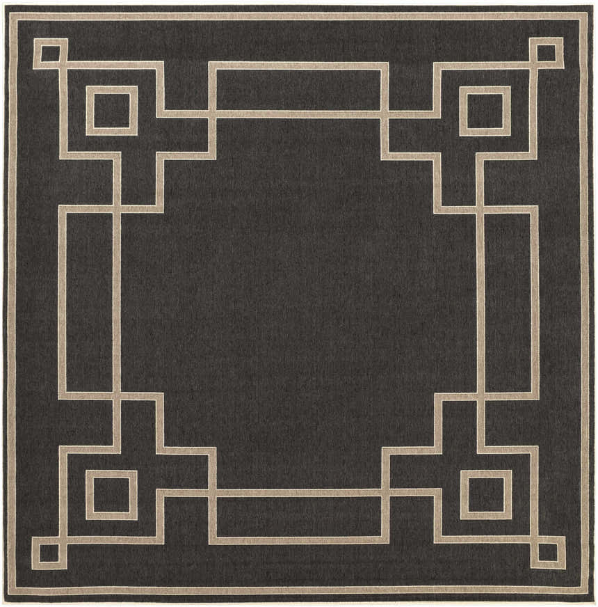 Close-up of Harborcreek Area Rug. Black olefin rug with a light beige geometric Greek key pattern border. Design-Square-89