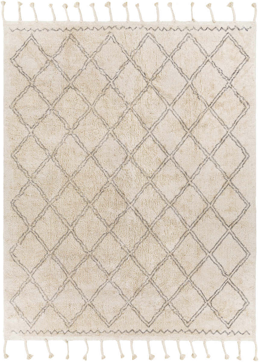 Close-up of the cream Harvester Area Carpet. Features a gray geometric diamond pattern and tassels. Hand woven cotton rug. Design-Rectangle-810