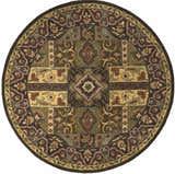 Close-up of the round Huguenot wool rug. Farmhouse style rug in beige, brown, olive, and teal floral pattern. Design-Round-6
