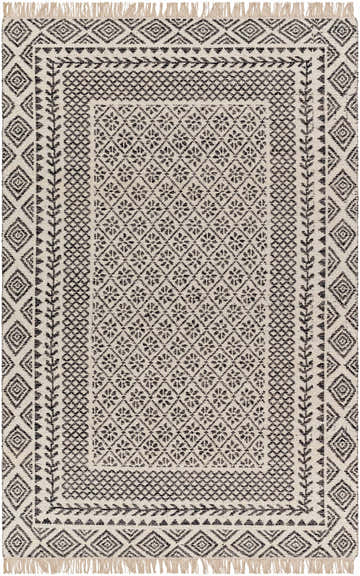 Close-up of the hand woven Hulda Area Rug. Farmhouse style rug in lambswool and dark gray with diamond and floral patterns. Design-Rectangle-576