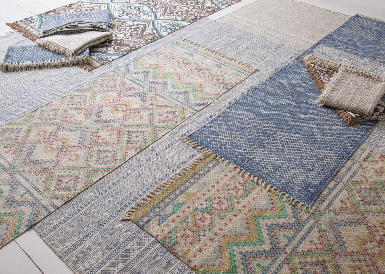 Granby Area Rugs in blue, olive, rose, and seafoam. Hand woven cotton rugs in farmhouse, traditional and transitional styles. Styleshot