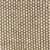 Close-up of Iqaluit Natural Jute Rug. Beige jute rug with a black geometric pattern. Hand woven texture. Swatch