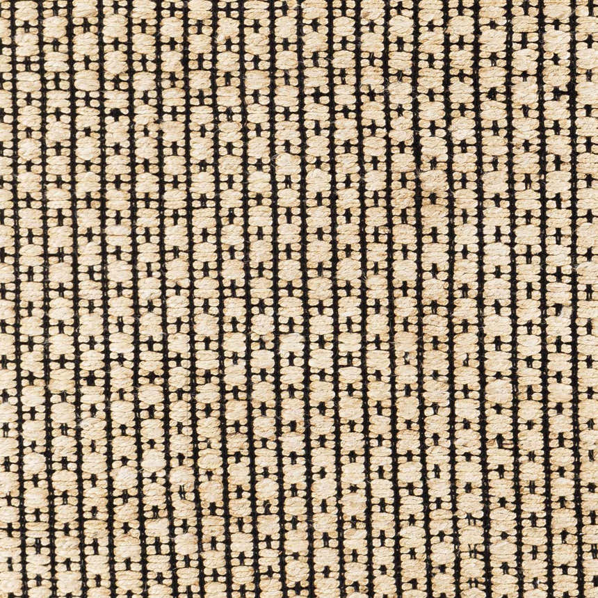 Close-up of Iqaluit Natural Jute Rug. Beige jute rug with a black geometric pattern. Hand woven texture. Swatch