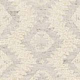 Close-up of the hand woven Jagupit Area Rug. Brown, cream, and light gray wool with a textured bohemian pattern. Swatch