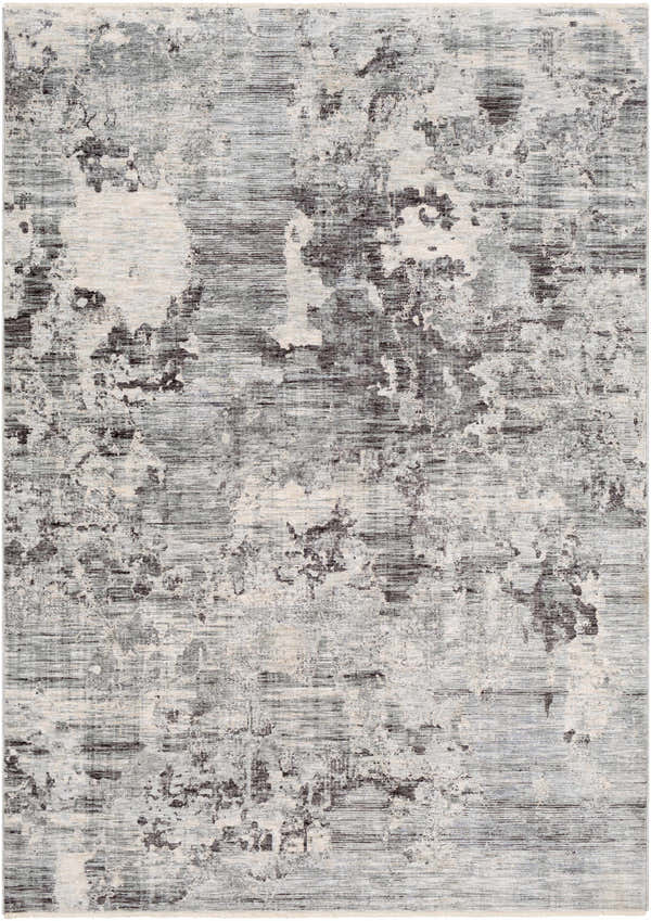 Close-up of the Johnetta Carved Statement Rug. Contemporary design in blue, charcoal, gray, and ivory hues. Abstract pattern. Design-Rectangle-582