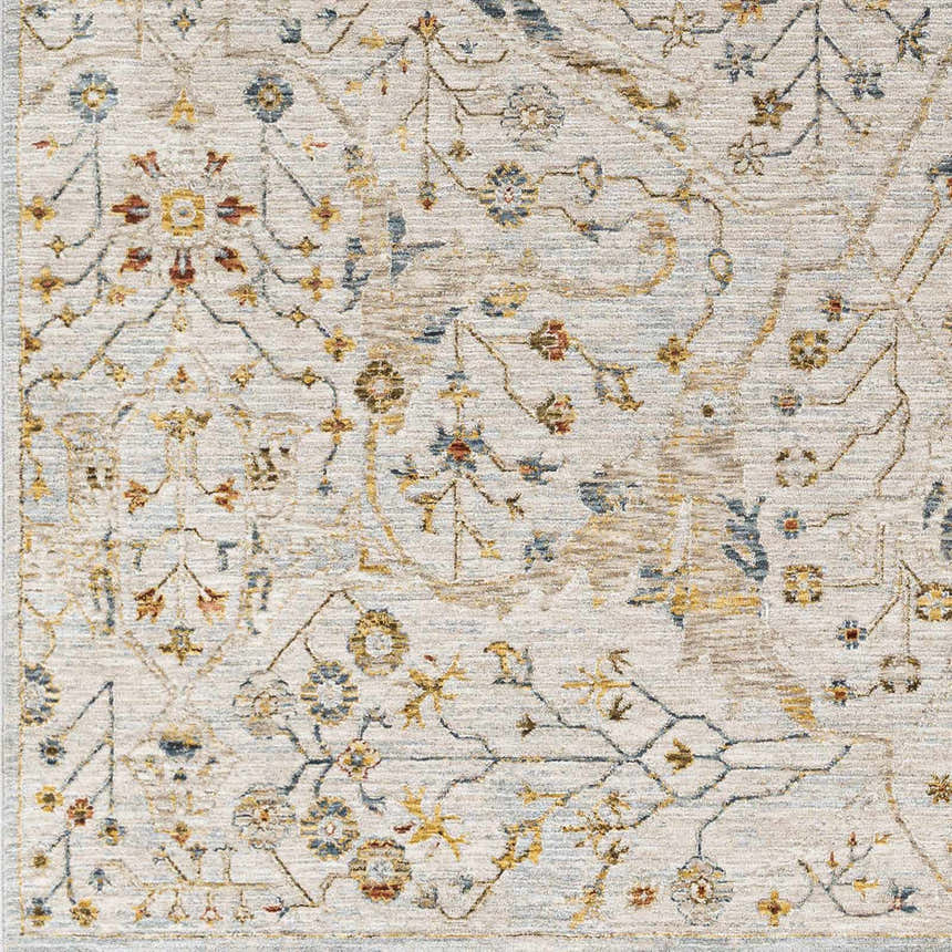 Close-up of the Kabungahan Oushak Style Floral Rug. Features a cream background with brick red, denim, and mustard floral accents. Swatch