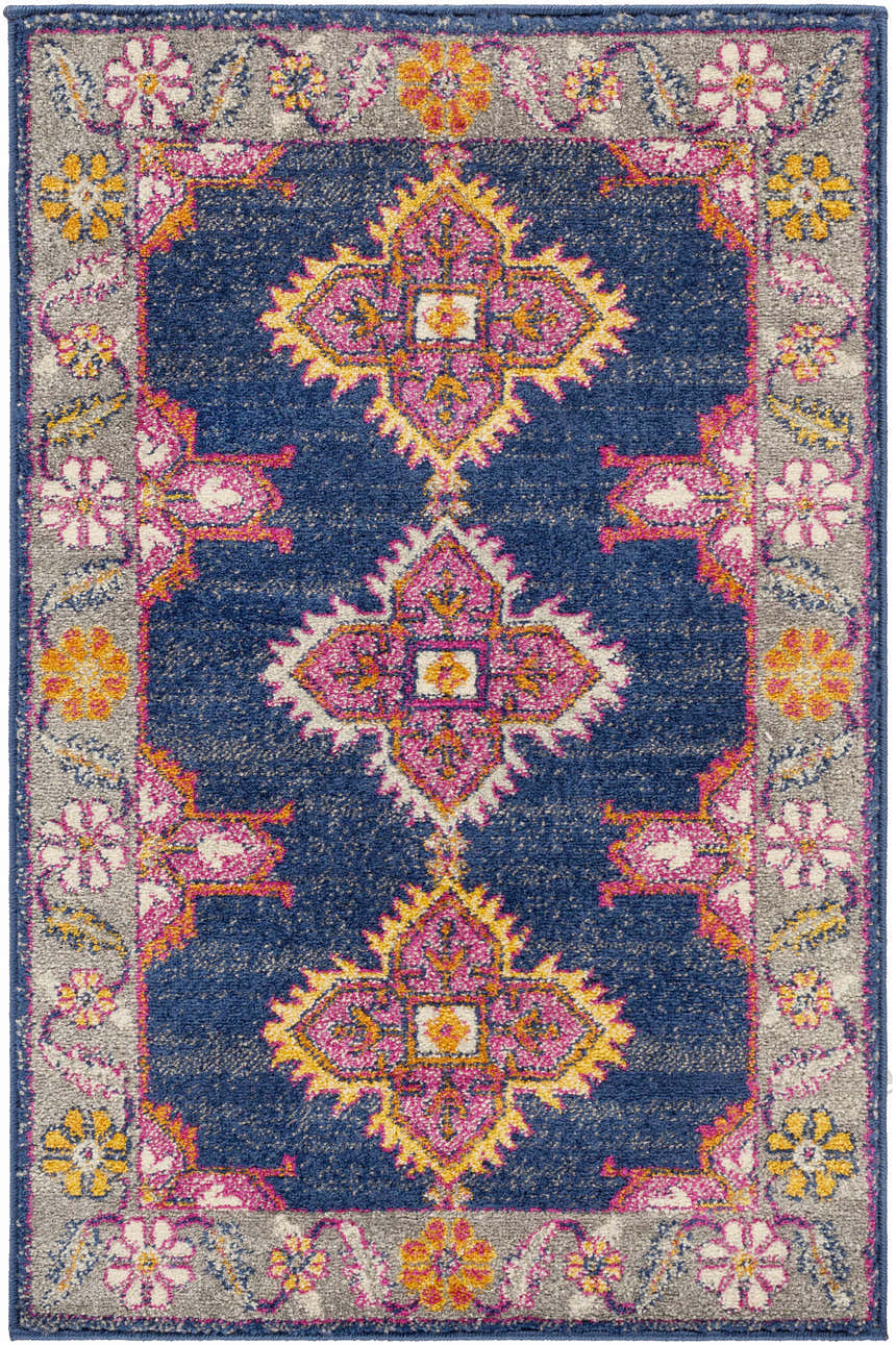 Close-up of the Kaitlyn Navy Area Rug, a machine-woven rug with a traditional, floral, and geometric pattern in navy, pink, and gold. Design-Rectangle-23