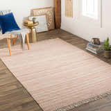 Living room scene with Kalinga Red/Cream Flatweave Wool Rug, wood floors, chair, and gold accent table. Roomscene-Rectangle