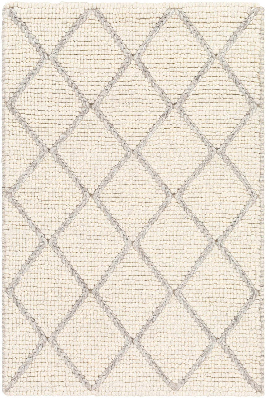 Close-up of the hand-woven Kanopolis Carpet. Cream wool rug with a contemporary gray diamond pattern. Viscose and wool blend. Design-Rectangle-23