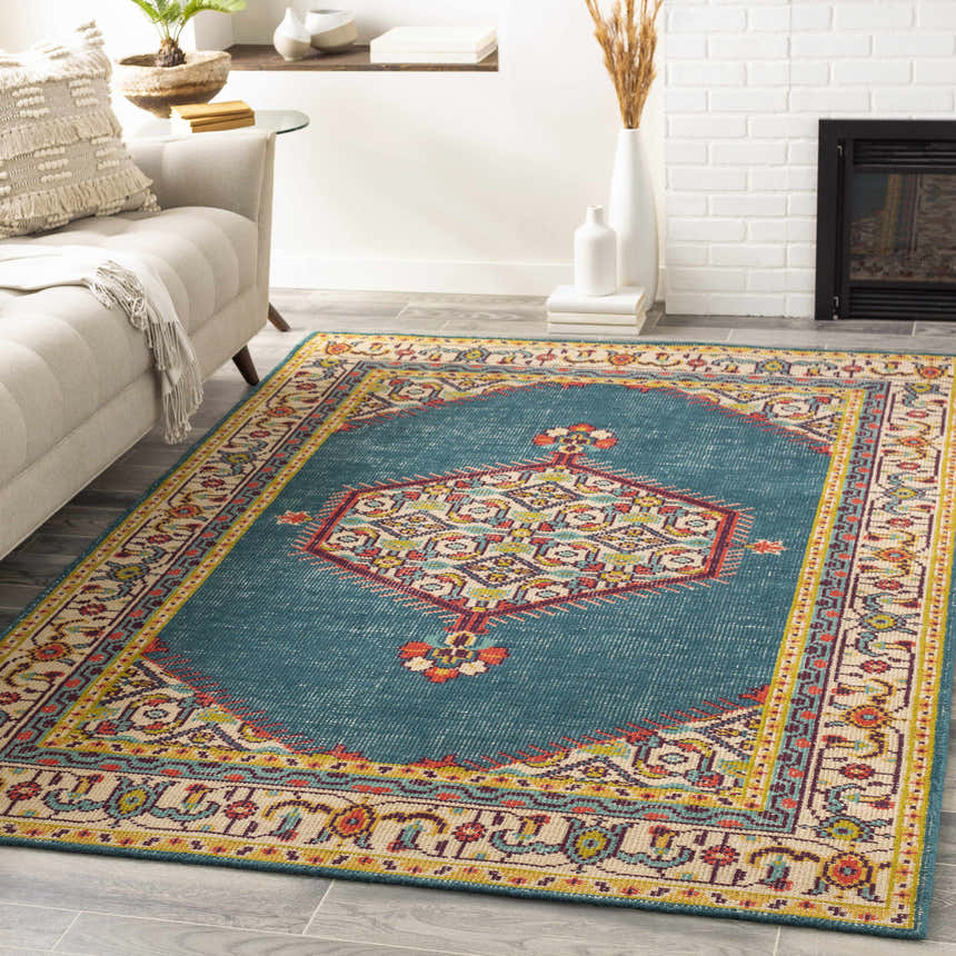 Living room scene with a teal Kaser Carpet. Farmhouse style with beige sofa and white brick fireplace. Roomscene-Rectangle