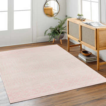 Entryway with Constantin Blush Area Rug, light wood console table, and wood floors. Roomscene-Rectangle