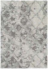 Close-up of the Kilgetty Gray Cloudy Shag Rug, showing its soft texture and abstract gray and off-white pattern. Design-Rectangle-537
