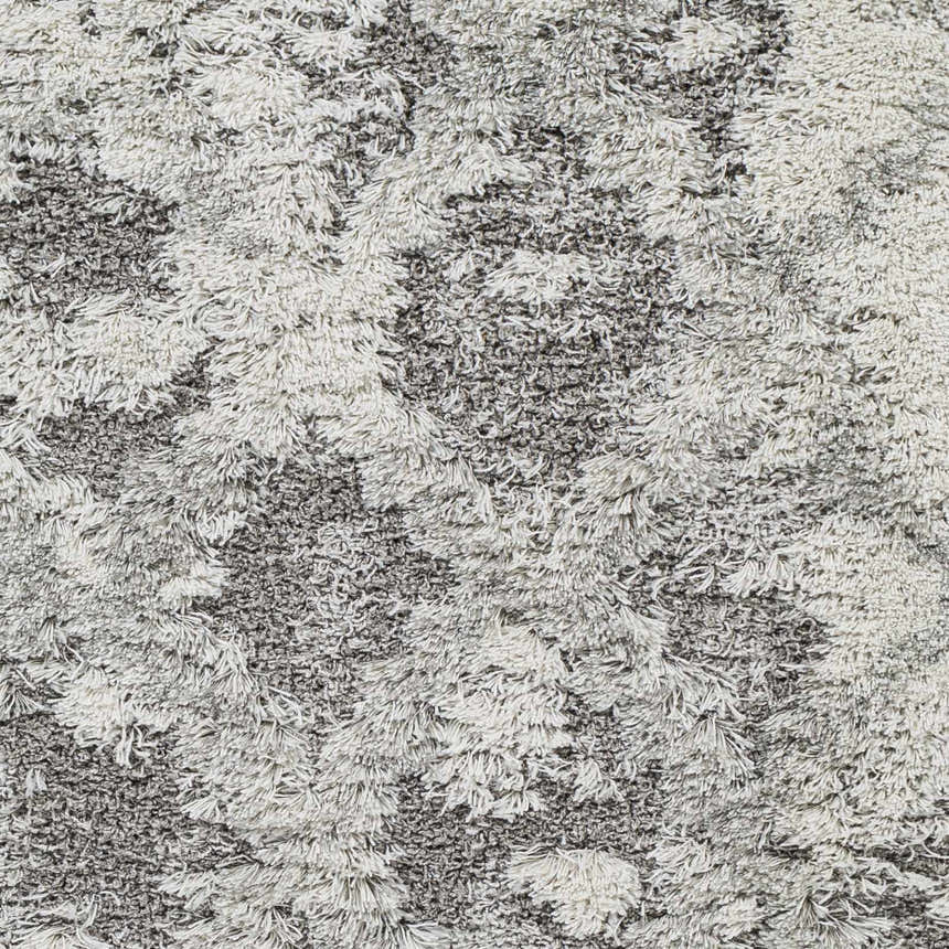Close-up of the Kilgetty Gray Cloudy Shag Rug showing the soft texture and gray and off white color variations. Swatch