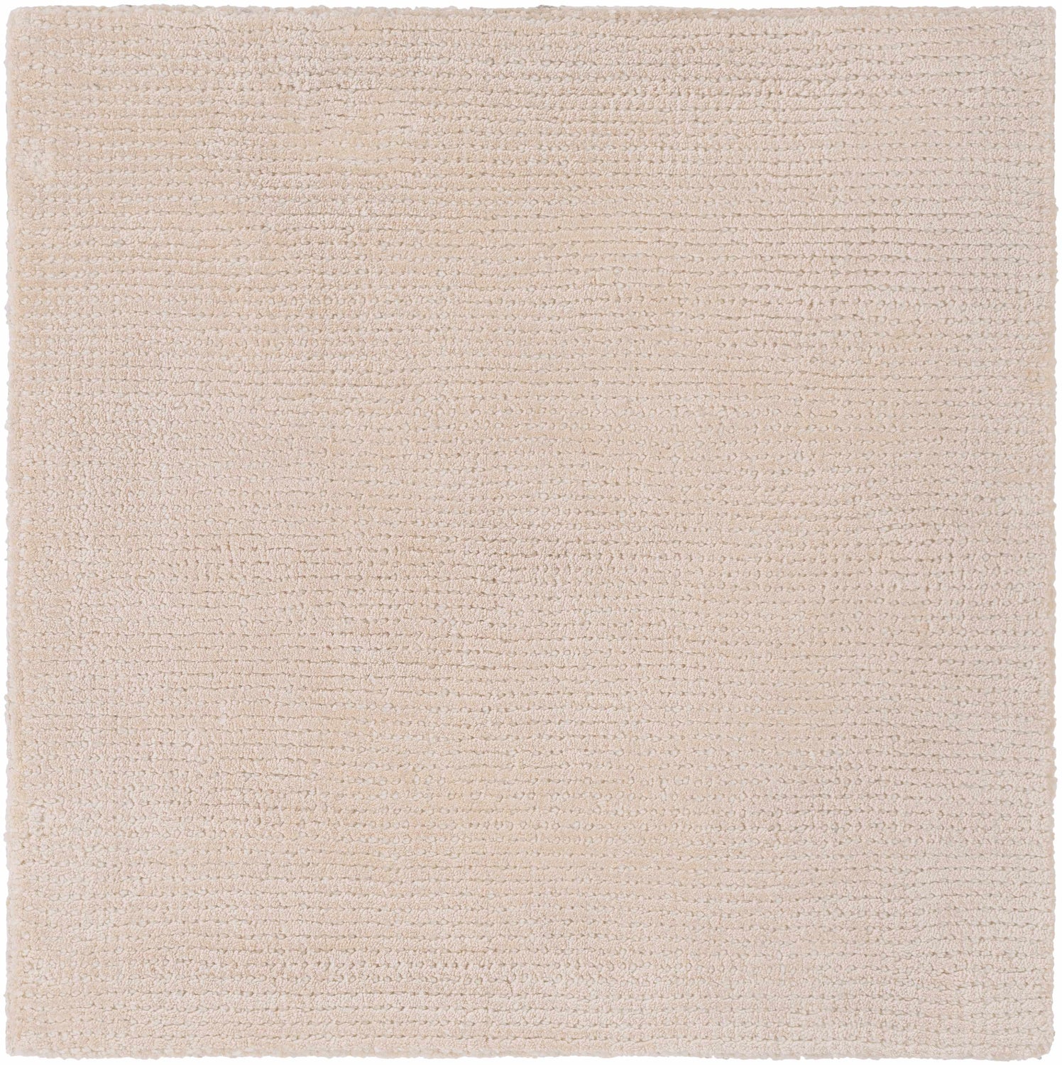 Close-up of the hand-loomed Klickitat Area Rug. Peach and white Tencel fibers create a soft, textured contemporary design. Swatch