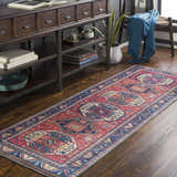 Entryway with a Kodiak Red&Blue Oriental Area Rug runner, dark wood console table, and blue throw blanket. Roomscene-Runner