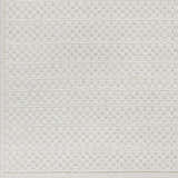 Close-up of the Kirkburton Beige Outdoor Rug, showing the contemporary geometric pattern and woven texture. Swatch