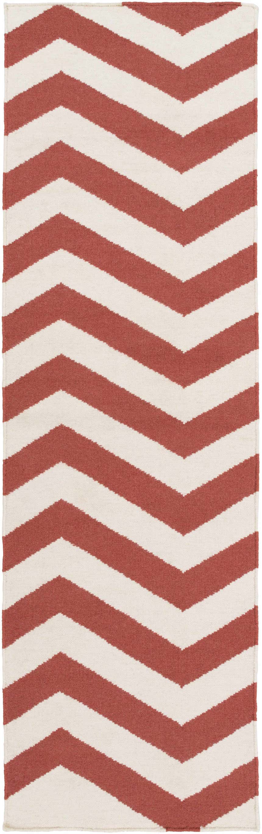 Close-up of the Lapeer Area Rug. Beige and rose wool rug with a bold chevron pattern. Hand woven texture. Design-Runner-268