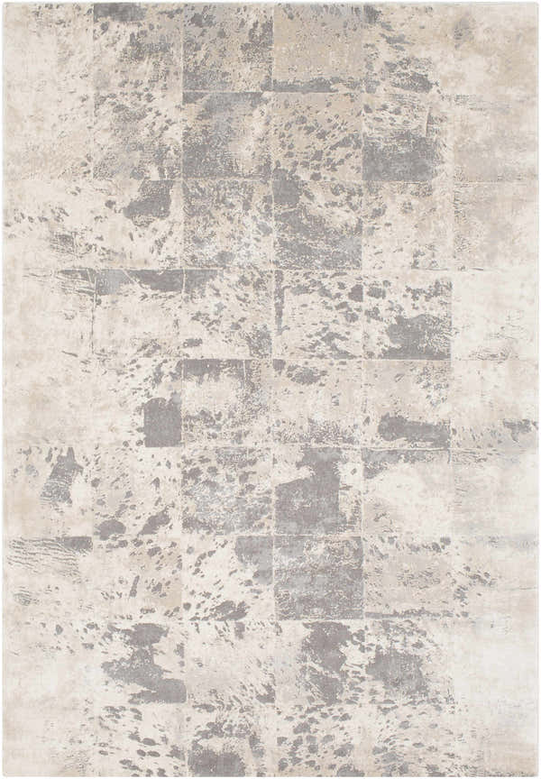 Close-up of the Lares Area Rug. Charcoal, light beige, medium gray, and tan tones with a contemporary animal pattern. Design-Rectangle-5376