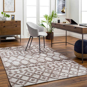Home office with wood desk and gray chair on Luce Area Rug. Farmhouse style with brown geometric pattern. Roomscene-Rectangle