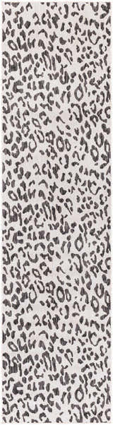 Close-up of the Alderbury White Leopard Print Rug. Features a black animal print pattern on an off-white polypropylene base. Design-Runner-2710