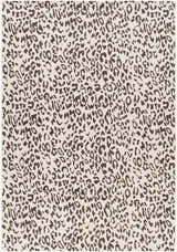 Close-up of the Alderbury White Leopard Print Rug. Black leopard spots on an off-white, machine-woven polypropylene rug. Design-Rectangle-537