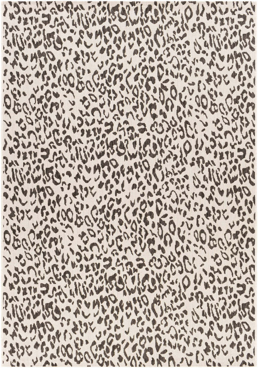 Close-up of the Alderbury White Leopard Print Rug. Black leopard spots on an off-white, machine-woven polypropylene rug. Design-Rectangle-537