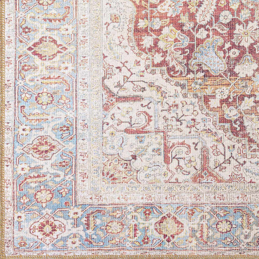 Close-up of the Cream Rust Leeston Washable Rug, showcasing its vintage-inspired, traditional pattern and brick red, cream, and light blue colors. Swatch