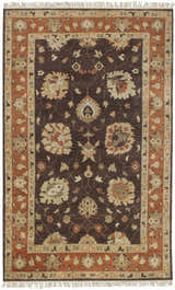 Close-up of the Lenapah Area Rug. Hand-knotted wool rug in beige, bone, charcoal, and brown with a traditional floral pattern. Design-Rectangle-58