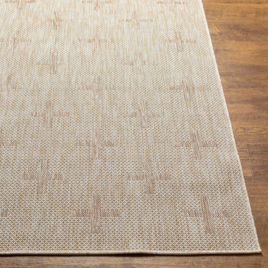 Close up of the Limbo Beige Outdoor Area Rug showing the woven texture and geometric pattern on wood flooring. Front