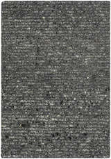 Close-up of the hand-tufted Winta Black Wool Area Rug. Gray, medium gray, and onyx tones create a textured, farmhouse style. Design-Rectangle-23