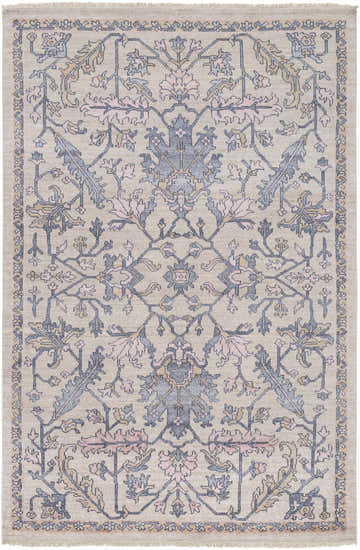 Close-up of the hand-knotted Loleta Area Rug. Beige rug with charcoal, dusty pink, and light beige floral pattern. Design-Rectangle-69