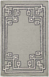 Close-up of the hand woven Lott Area Rug. Gray wool rug with ink blue and light gray geometric border pattern. Design-Rectangle