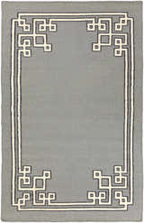 Close-up of the Lott Area Rug. Hand-woven wool rug in gray with geometric ink blue and light gray border pattern. Design-Rectangle