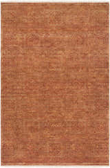 Close-up of the Lottsburg Premium Orange Wool Rug. Hand-knotted rug with traditional floral and geometric patterns in blush, brown, and tan. Design-Rectangle-5686