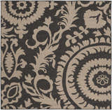 Close-up of the Loughton Area Rug. Black background with a light brown floral and paisley pattern. Machine woven texture. Design-Square-73