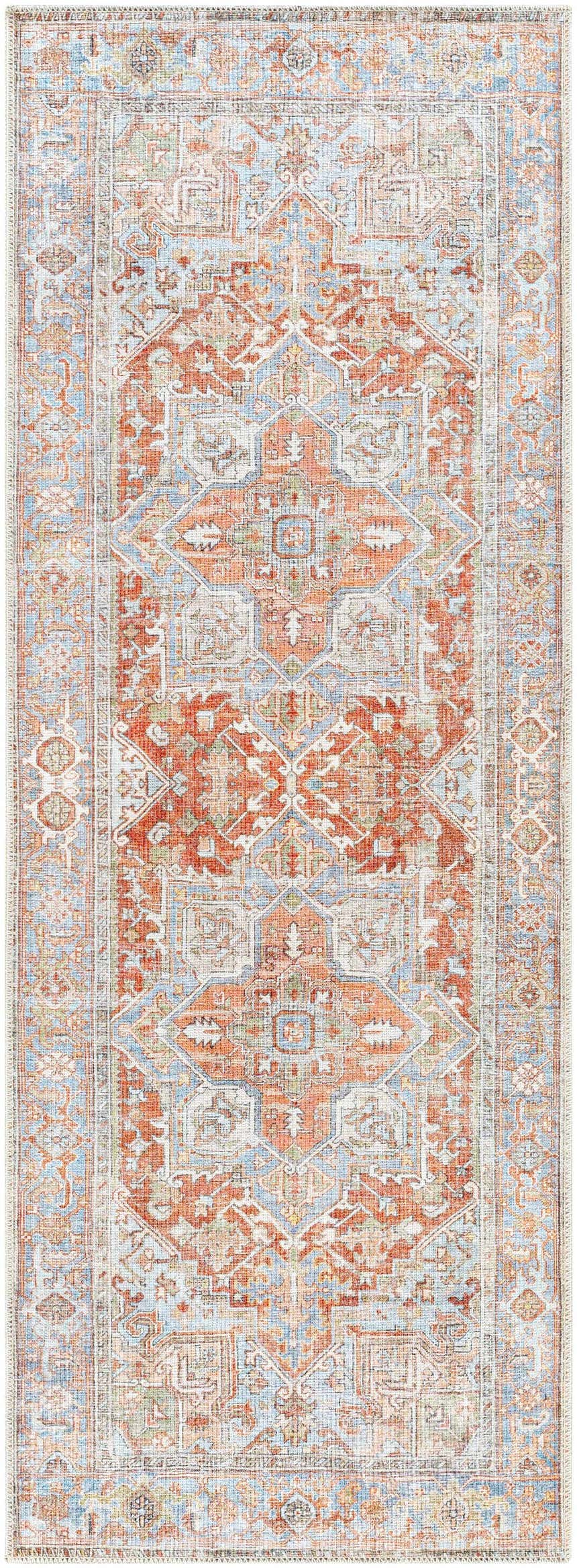 Close-up of the Rust Maayon Washable Rug, a traditional rug with brick red, blue, and sage green oriental-inspired patterns. Design-Runner-2773